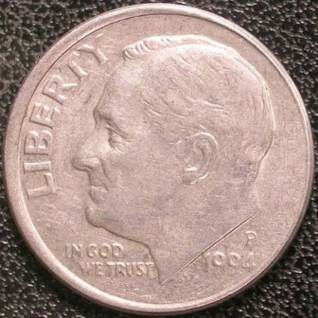 1994 Roosevelt dime off-center strike error showing displaced design with blank planchet crescent visible